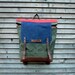 Waxed canvas backpack / rucksack with folded top and waxed leather shoulderstrap and bottom