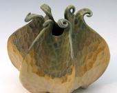 Porcelain urchin vessel in green, tan & white