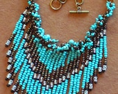 Native American tribal style fringed necklace in turquoise, bronze and silver