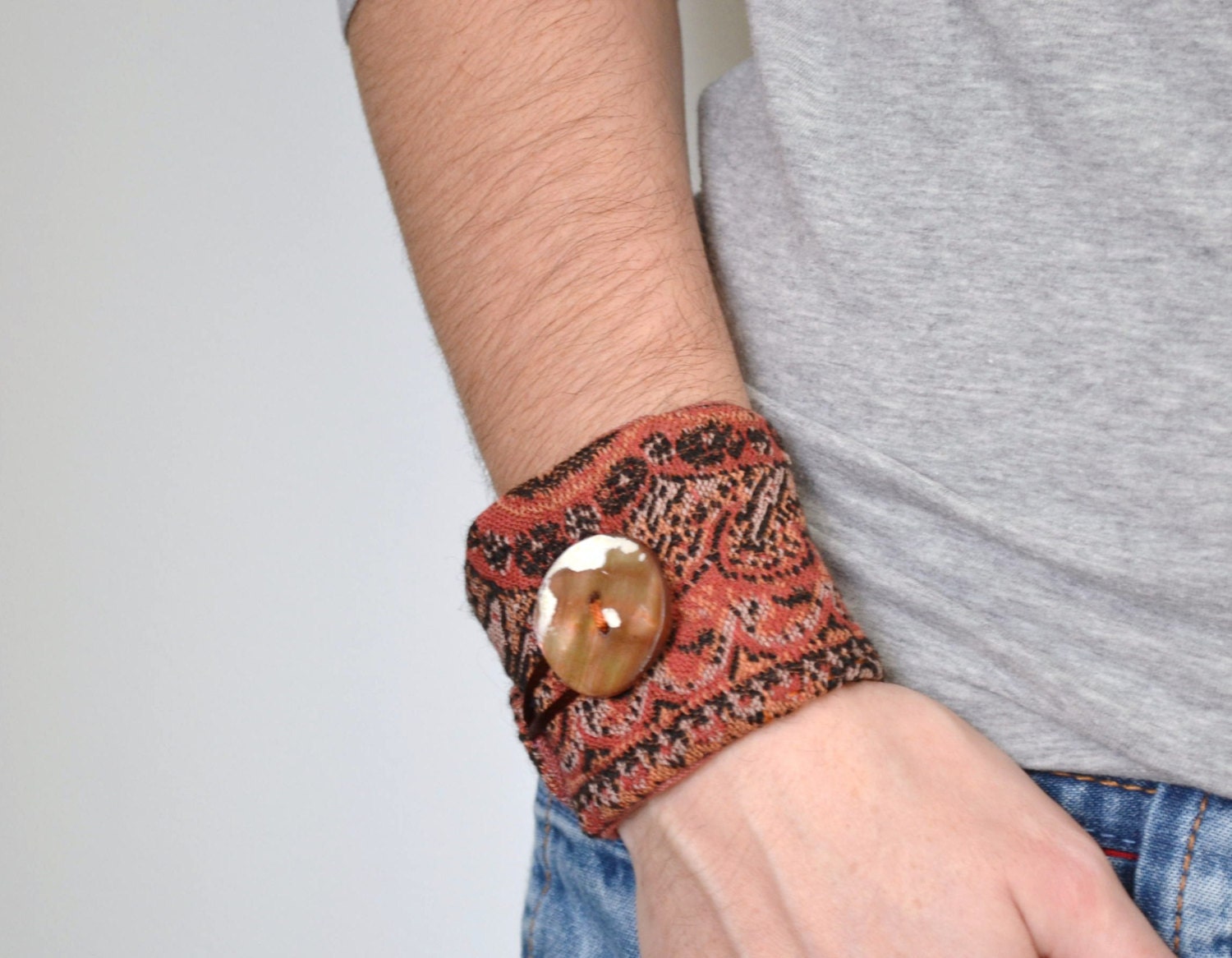 rust orange woven wrist cuff - organic shaped woollen pattern - black and rust orange - vintage dutch folk cloth - free shipping