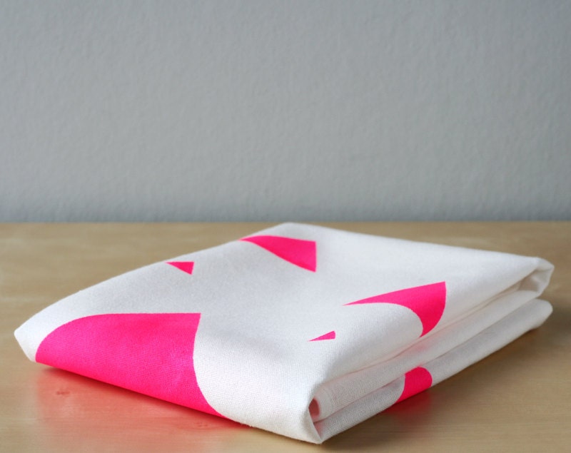 Triangles tea towel in neon pink