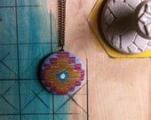Four Corners Sun Necklace