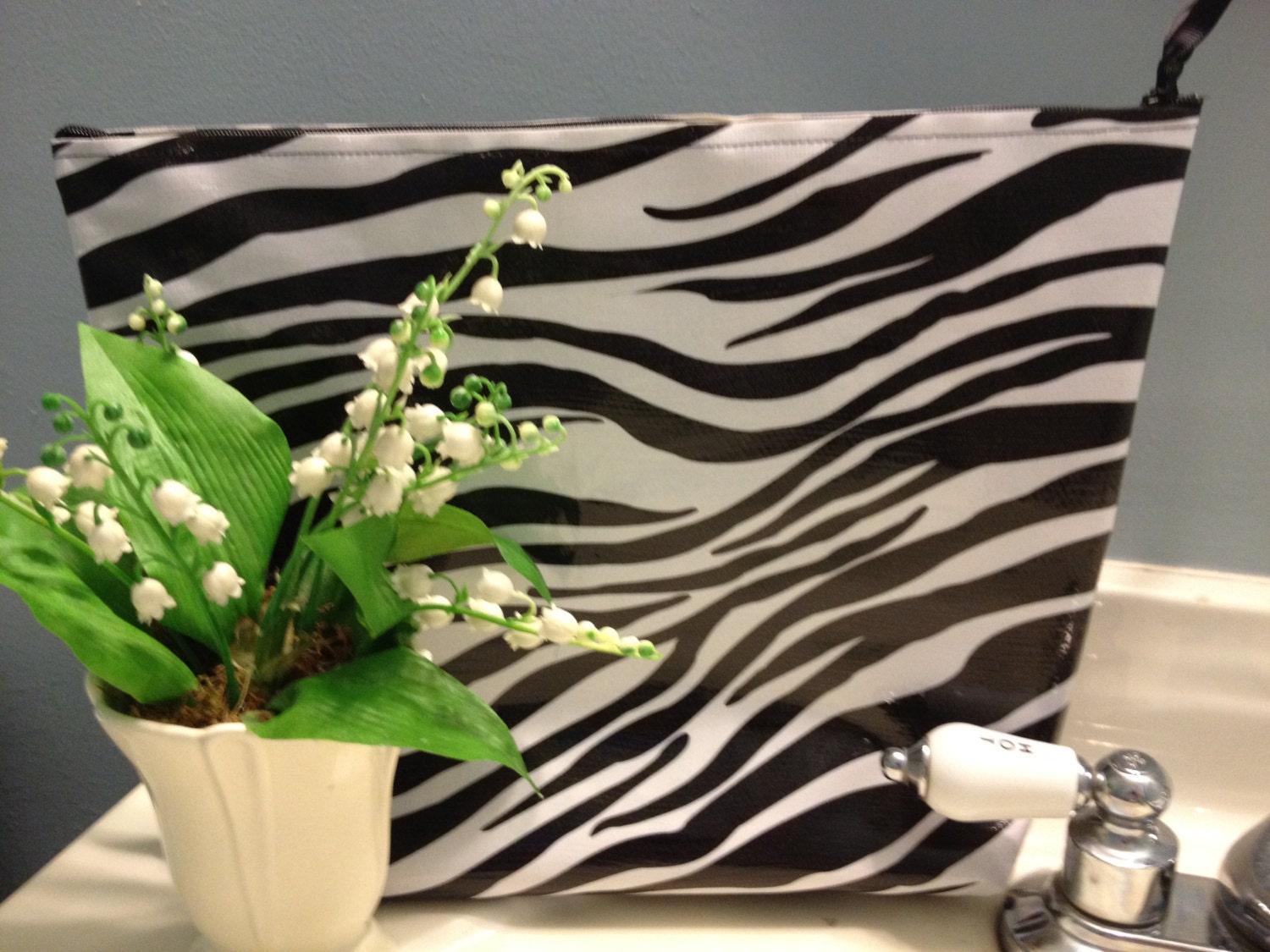 Large Waterproof Cosmetic Bag or Wet Bag of Oilcloth in Zebra Stripes with Black Polka Dot Interior