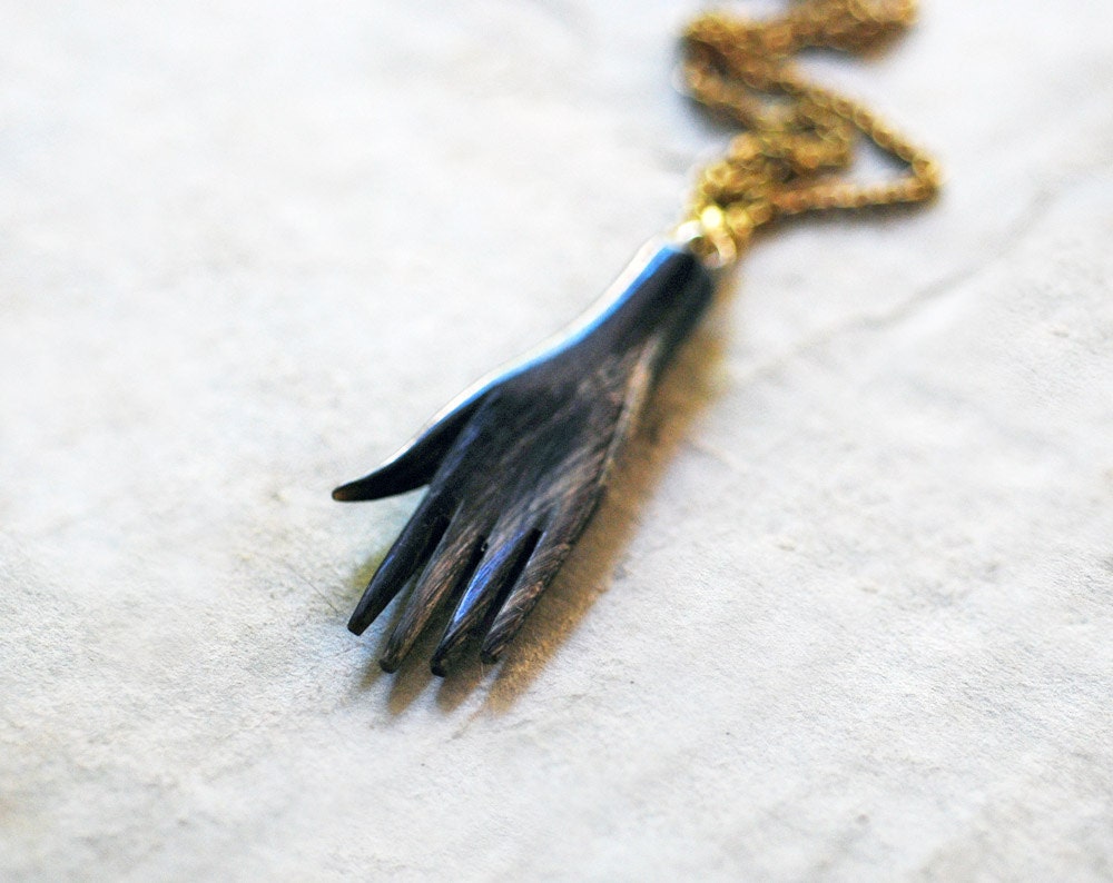 no. 143 - carved buffalo horn hand pendant on vintage brass chain