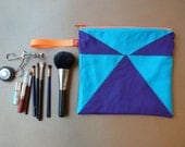 Zippered, hanging toiletry kit, cosmetics bag.  Purple, Turquoise, Neon Red Zipper Triangle Hipster Modern.