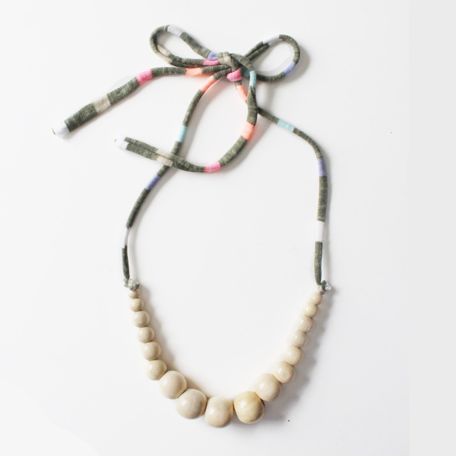 Color Pop Necklace in Vanilla & Color Stripe . Non-toxic Beads with a Jersey Tie . Fashionable and baby-friendly