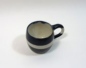 Indigo mug with unglazed stripe