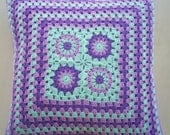 the turquoise , lila and purple granny square cushion cover