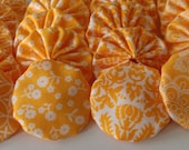 20 fabric yoyos orange sherbet 4 different fabrics  2 inch round  ready to ship