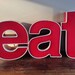 Reclaimed Metal letters - eat