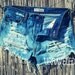 Bleached denim Levis High Waisted Shorts (SMALL)