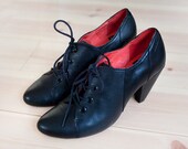 Black leather oxfords spectators