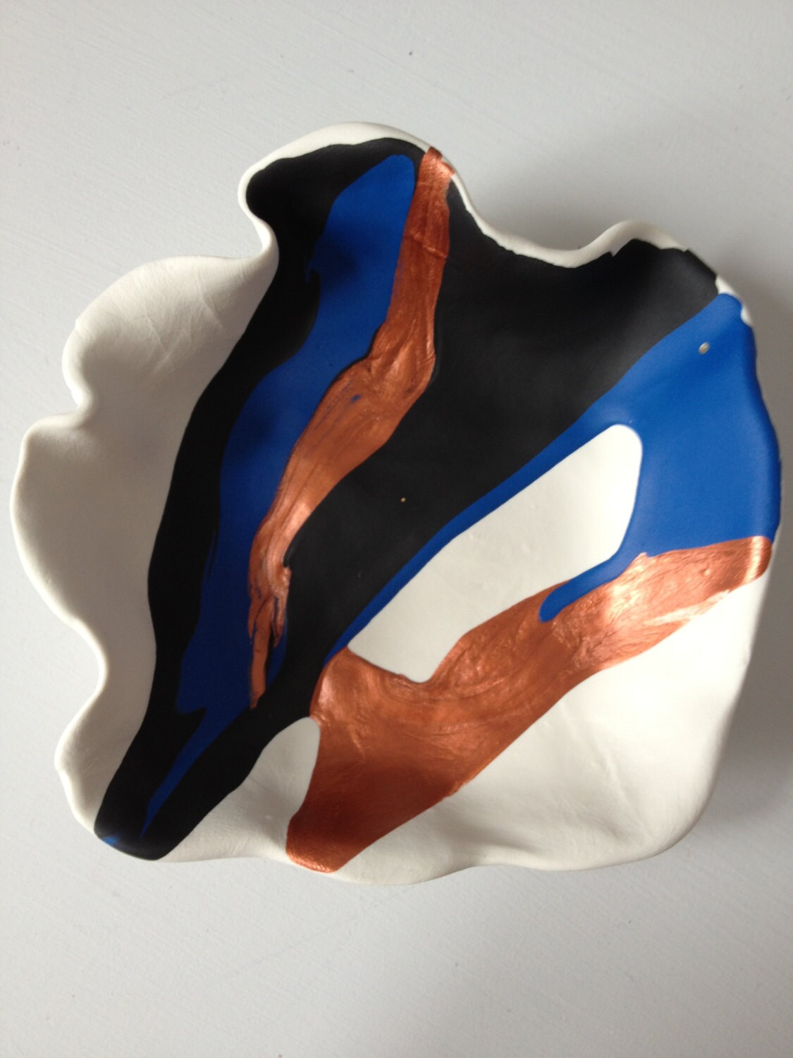 Southwestern Santa Fe style blue, black, and copper handpainted polymer clay decorative bowl