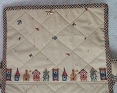 Two(2) Mug Rugs  A Row of Birdhouses on a Tan Print covered withTiny Birds