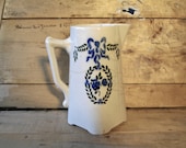 Lovely antique french white pitcher with romantic setting