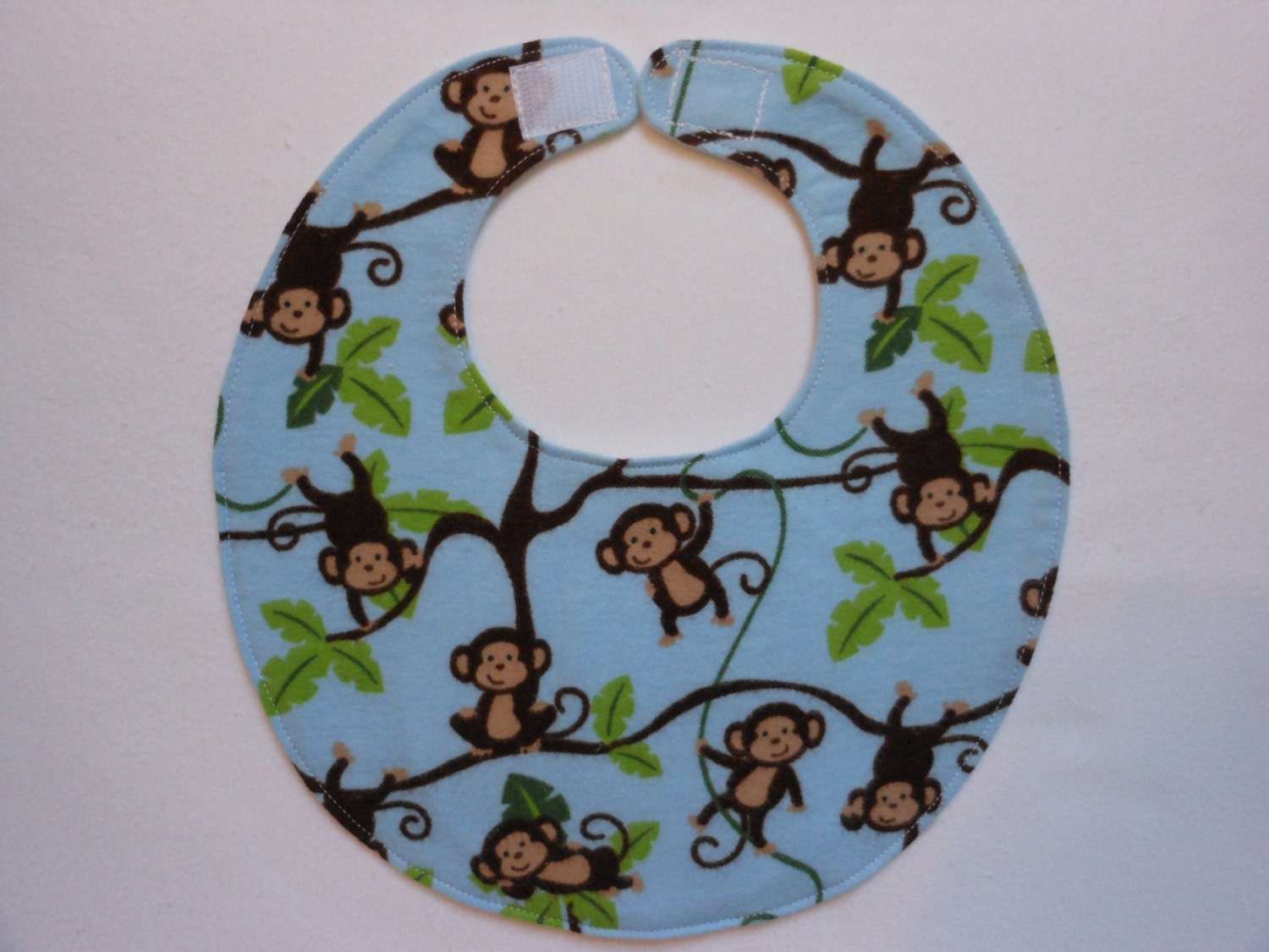 Baby Bibs, four soft layers, reversible, blue with crazy, cute monkeys