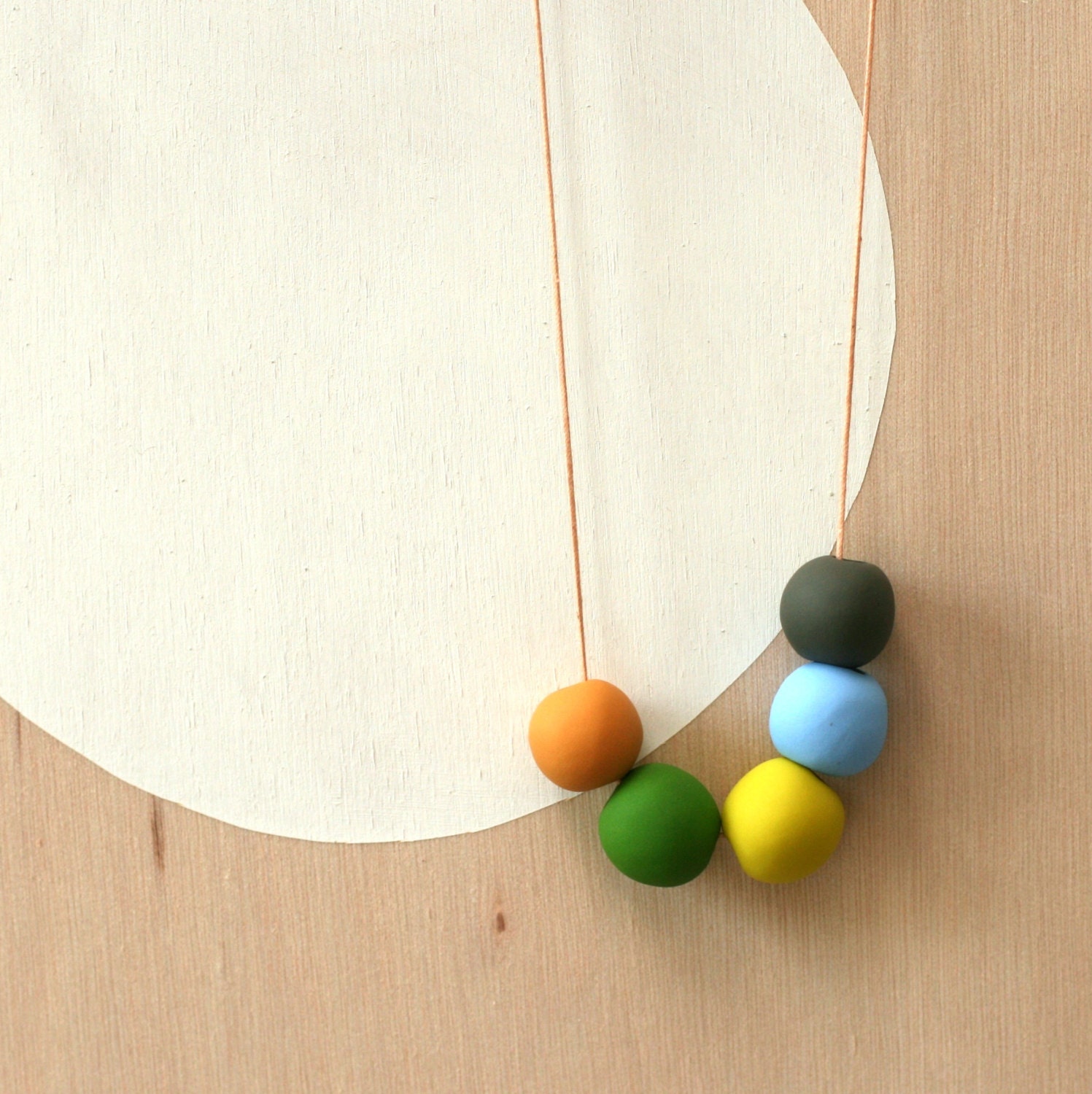 not quite round handmade beads make a necklace