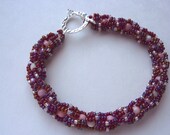 Spring Trends Seed Bead Triple Spiral Woven Bracelet in Rose Iris Czech Glass With Pink Stone and White Shell Bead Center Channel
