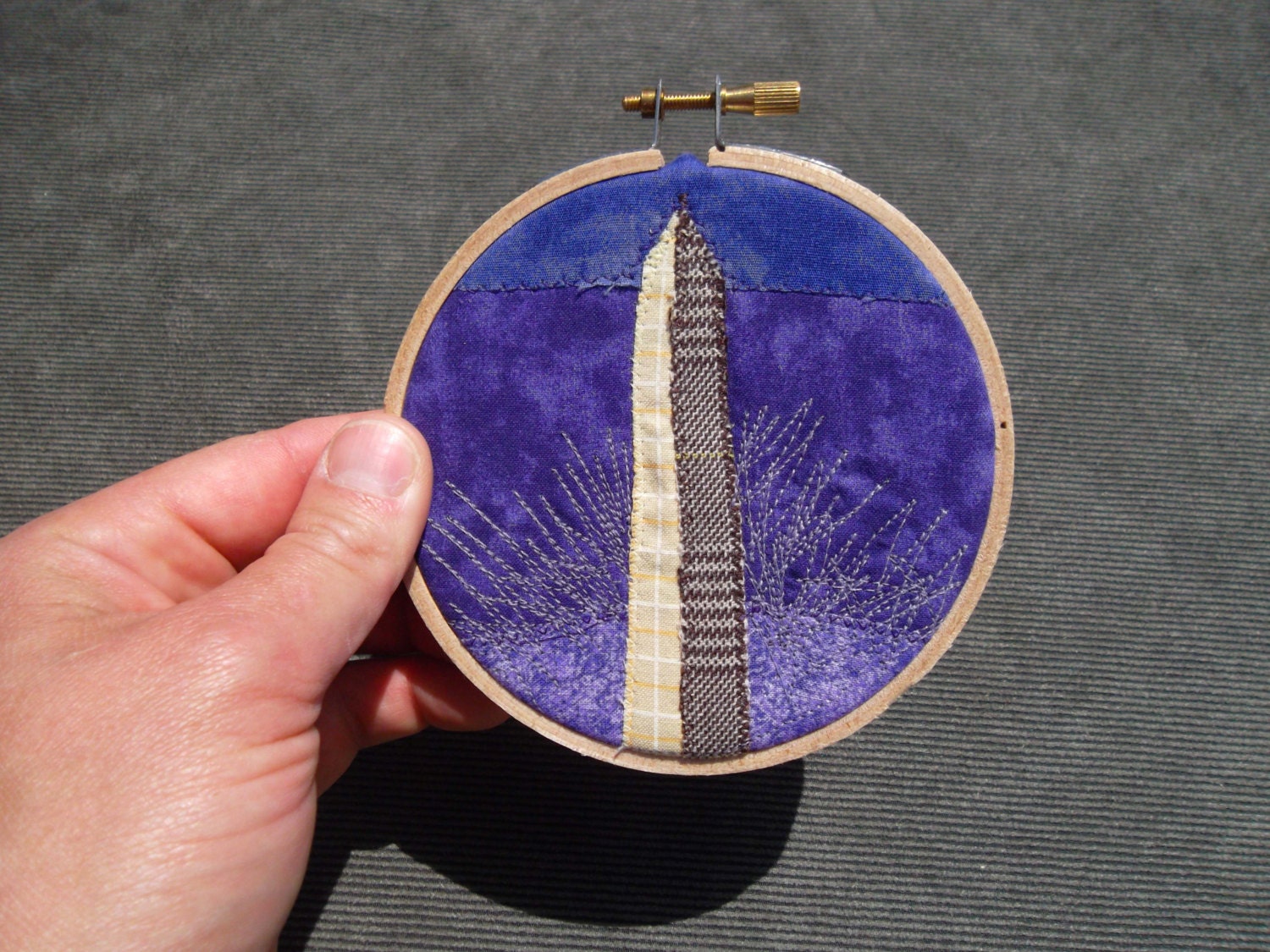 Mini Hoop, "Washington Monument with Purple Night Glow Sky," OOAK, recycled fabric artwork, mounted in 4 inch embroidery hoop, ready to hang