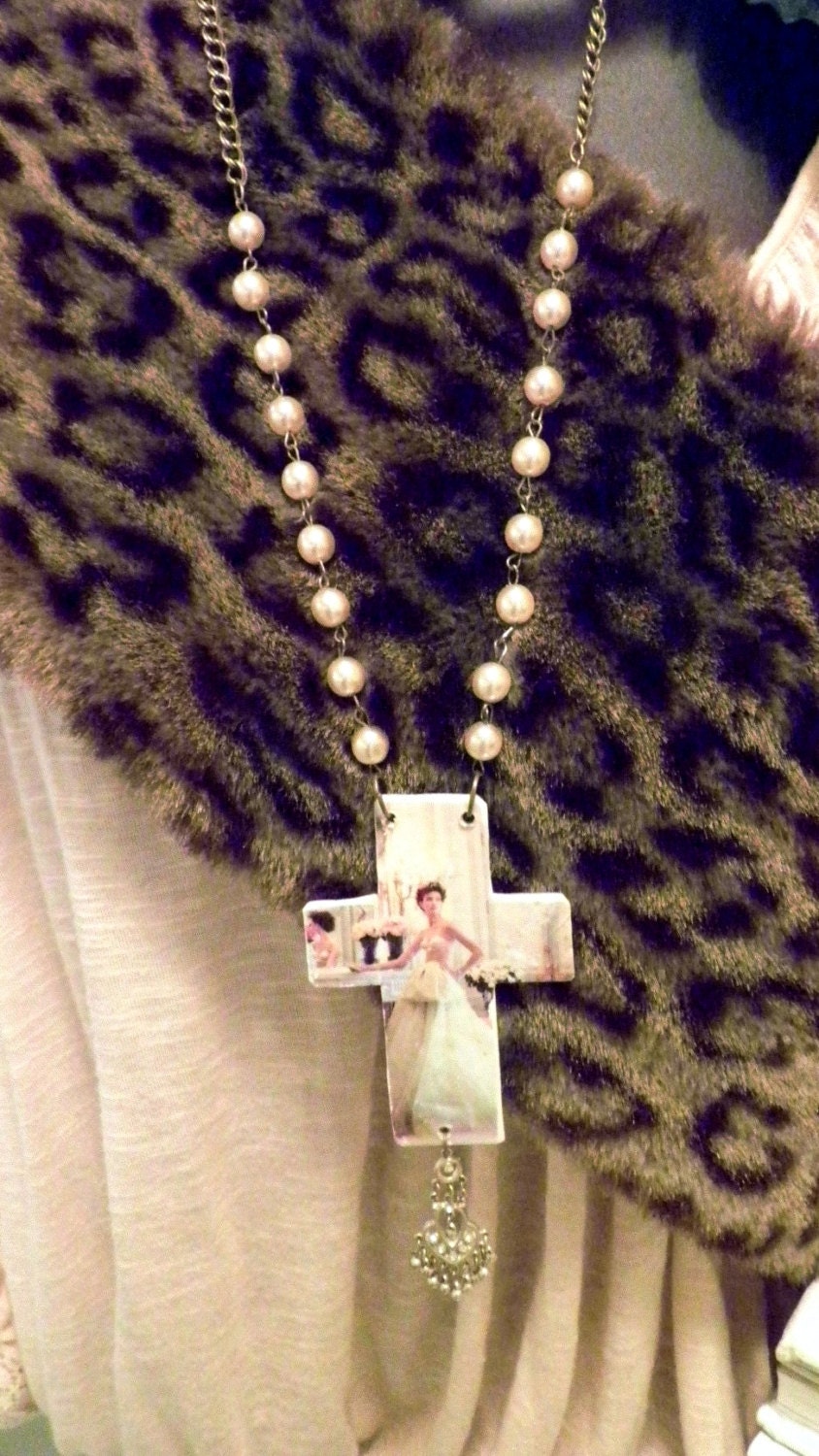 SOLD to a very chic gal. Very vogue cross on upcyled pearls for the edgy stylish woman . A real dramatic statement