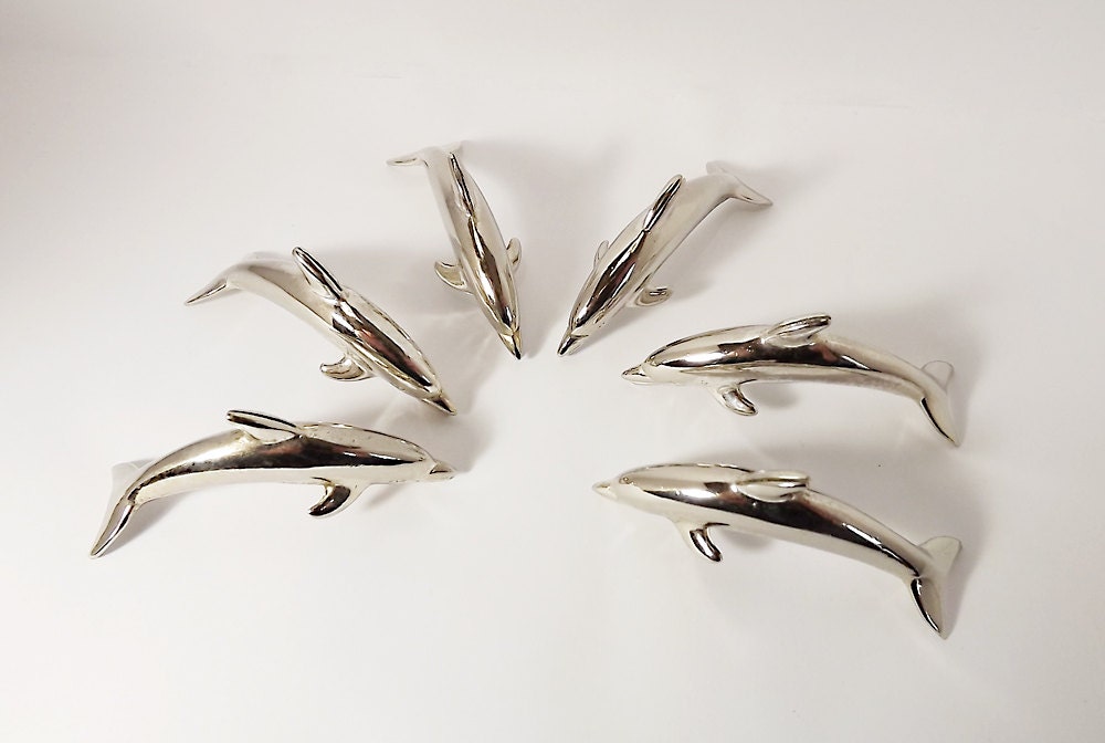 Six dolphin place card holders