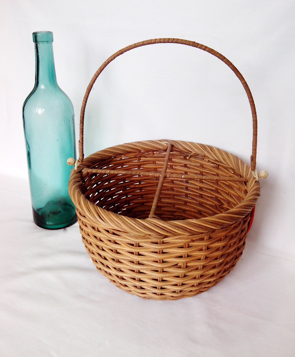Vintage wicker basket with fold down handle