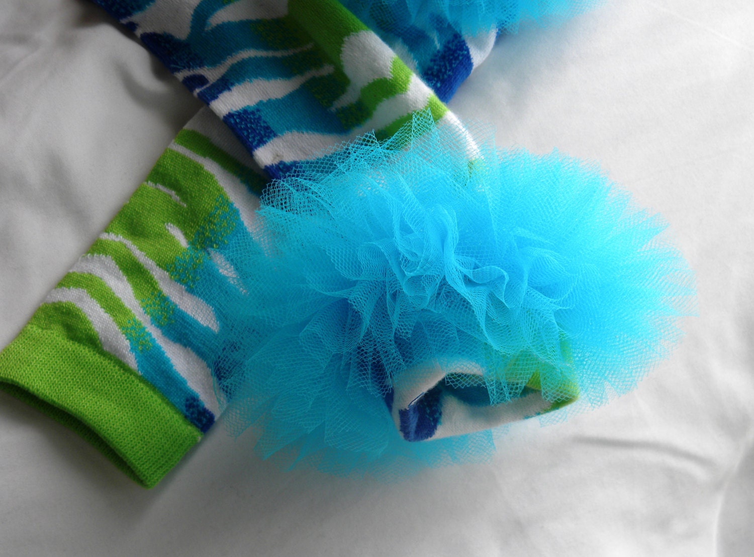 Baby Leg Warmers: Zebra Stripes of Turquoise, Lime Green, Blue, and White with Green Ruffle Trim