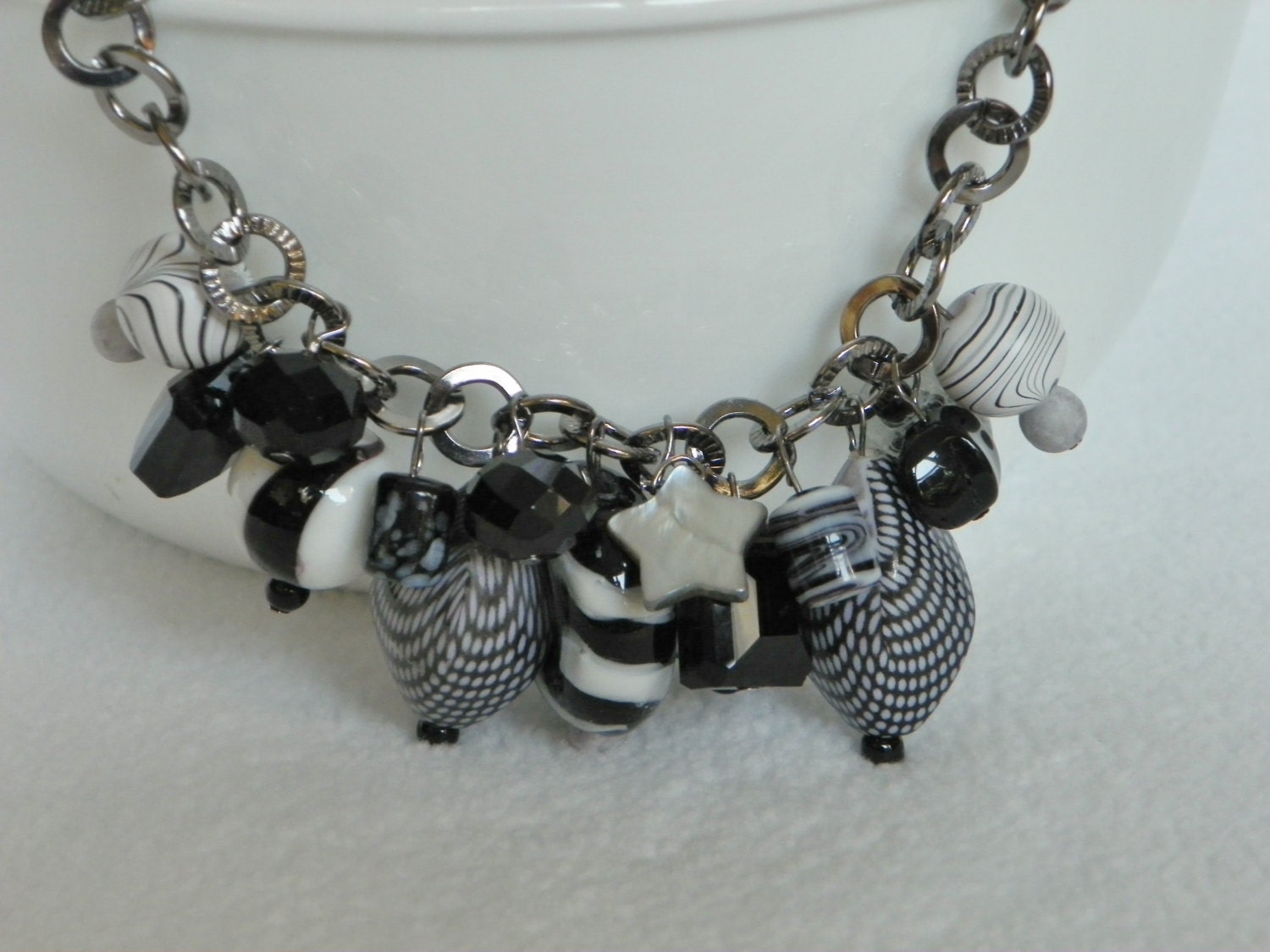 Black & White Cookie-antique silver chain necklace with a cluster of bold dangling black and white beads with earrings