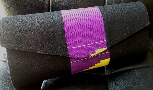 Purple and yellow kente on black clutch by Gitas PORTAL