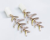 4g-5/8" Gold Fish Like Bone Design with Rhinestone Accent Dangle Tunnels