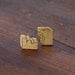 24 karat gold-plated hand engraved architectural fragment stud earrings