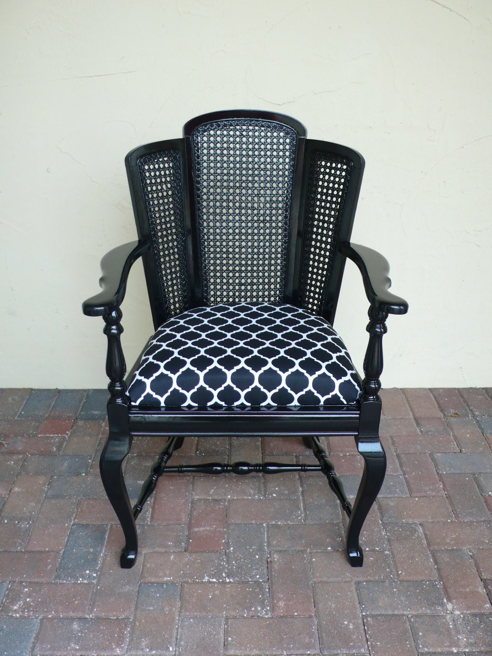 Rare oversized cane fan back armchair...rare rare black chair with geometric pattern