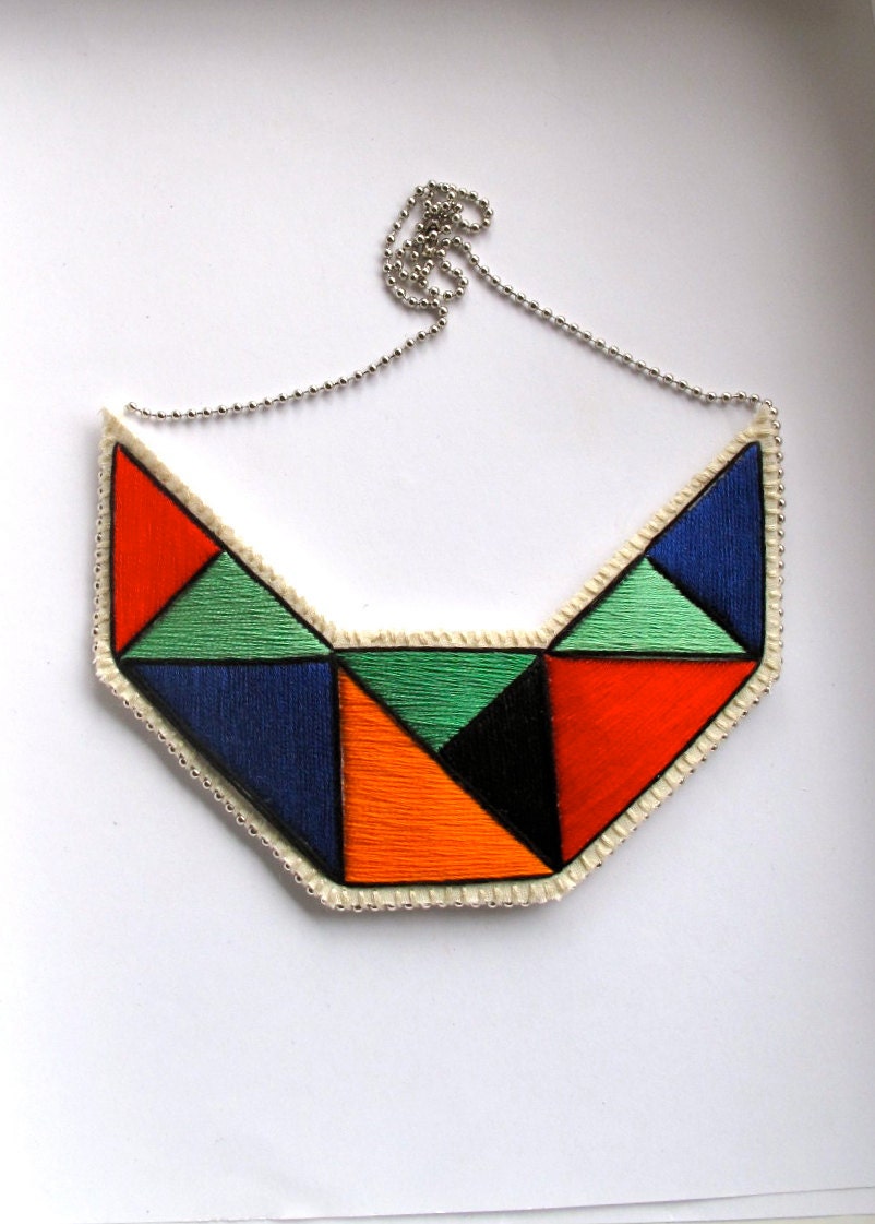 Textile necklace embroidered geometric triangles in beautiful colors of green orange red blue and black
