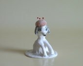 a Pincushion Porcelain dog
