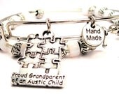 Proud Grandparent Of An Autistic Child Set of two beaded bangles charm bracelet