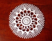 Small white crochet round doily