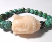 African Turquoise Beaded Bracelet with White Buddha and Grey Rhinestone Bead