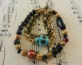 Skull Bracelet Reclaimed Vintage Beads and Chains Turquoise Gold Black