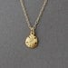 Tiny Gold Sand Dollar Necklace also in silver