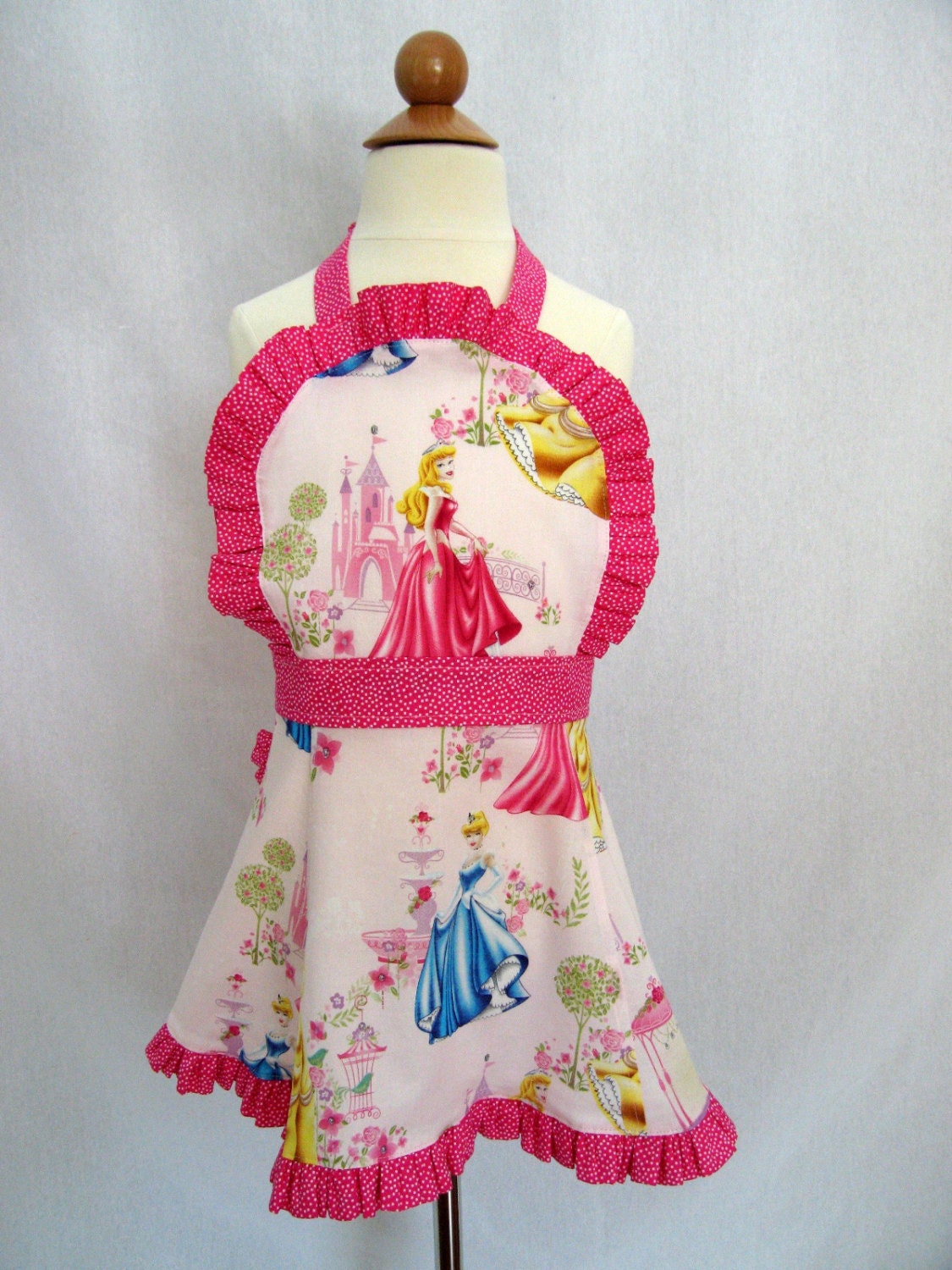 Pink Little Girl's Ruffled Apron with Disney Princesses - Springs Creative Fabric