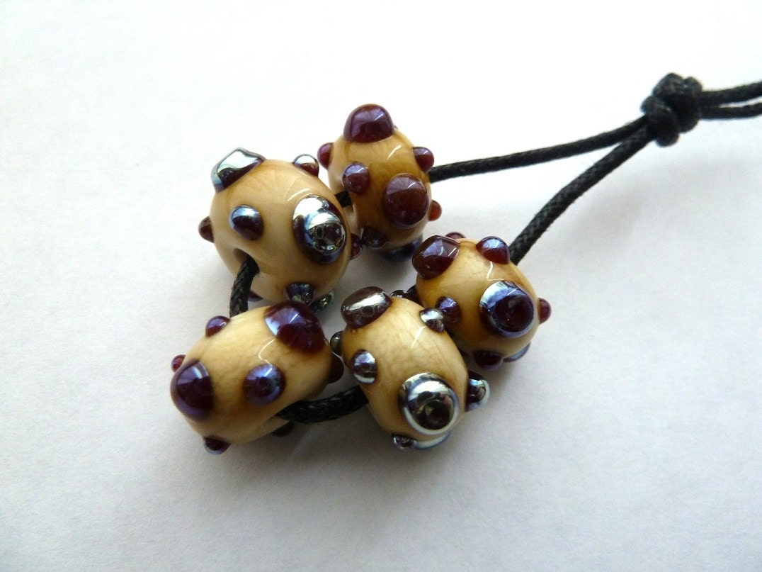 handmade lampwork glass beads, silver bumps