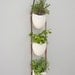 3 tier porcelain and leather planter- brown