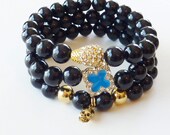 Beaded Bracelet Set of Semiprecious Jet Riverstone with Gold Pave Teardrop, Cobalt Blue Enamel Clover and Gold Skull Charm