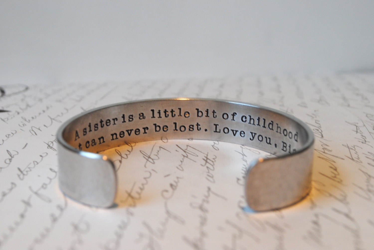 A Sister is a Little Bit of Childhood that can Never Be Lost Secret Message Cuff Bracelet