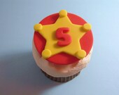 Sheriff Badge Fondant cupcake toppers shown in red and yellow for Wild West western birthday party wild west