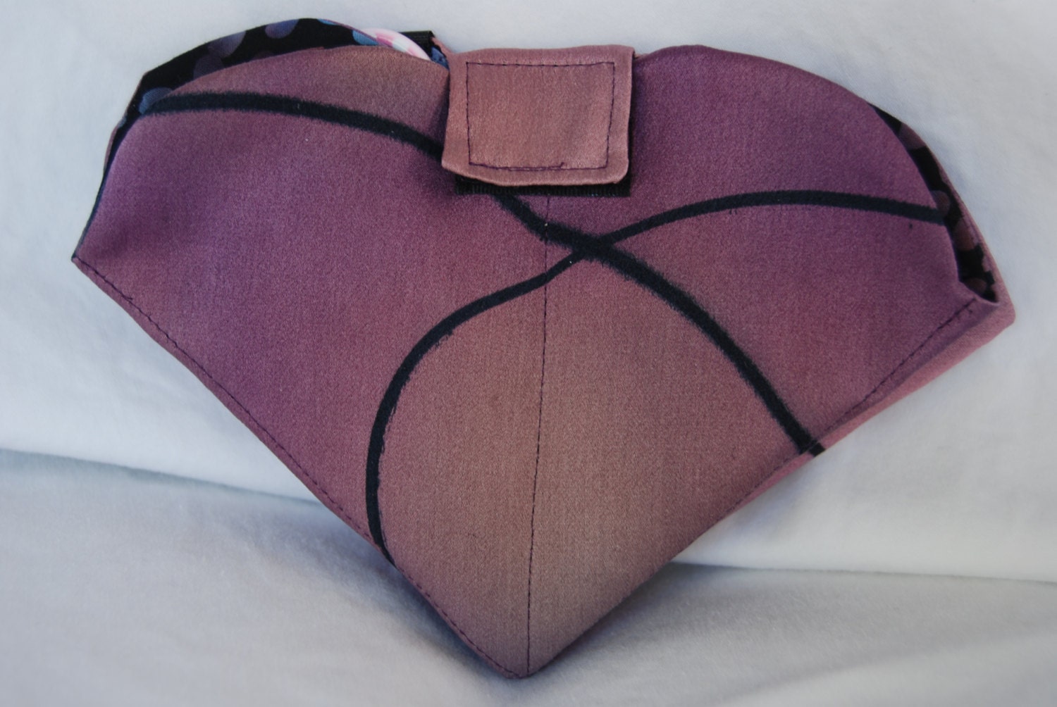 Lavender Sewing Kit (105) is a unique, folding clamshell shaped sewing kit in hand dyed silk, cotton, and felt.
