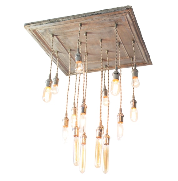 Salvaged barn tin repurposed into chandelier with various edison bulbs for local pick up