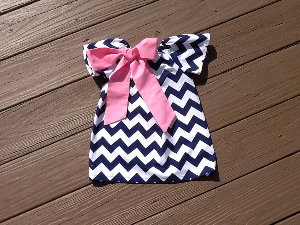 Girls Little Peasant Dress with fabric bow detail. Navy blue or any chevron fabric. Custom children's clothing. By EverythingSorella