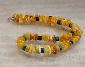 Amber necklace of butterscotch and handmade ceramic beads