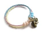 Pastels and bubblegum squirrel bracelet, memory coil, toho, Czech glass, animal bracelet